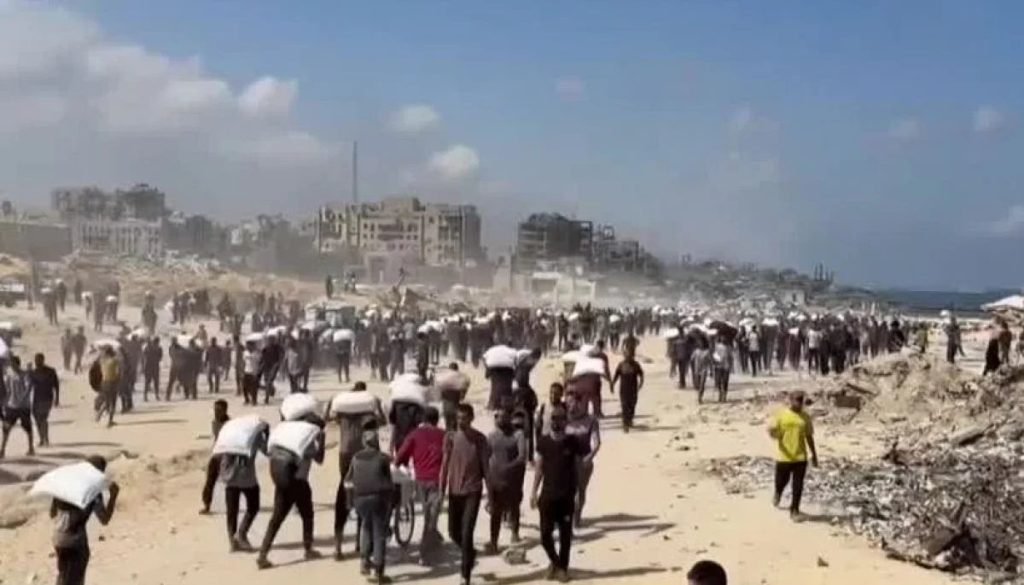 Mueren Gazatíes en un Ataque Israelí a Puntos de Ayuda Humanitaria - Crisis Humanitaria: 81 Gazatíes Mueren en Ataque Israelí